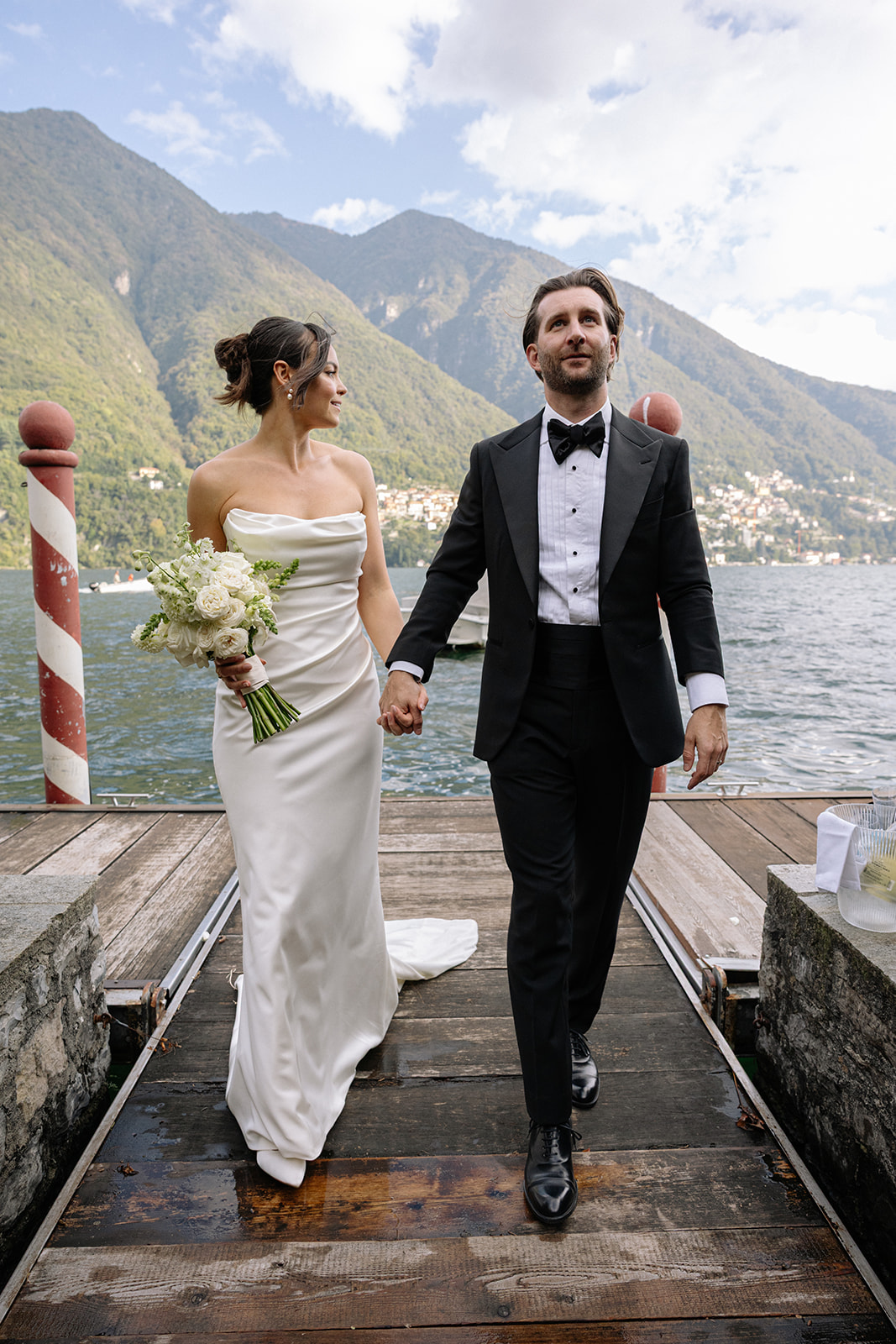 Gala Wedding Italy, Italian wedding planner couple lake side at Como black tie groom