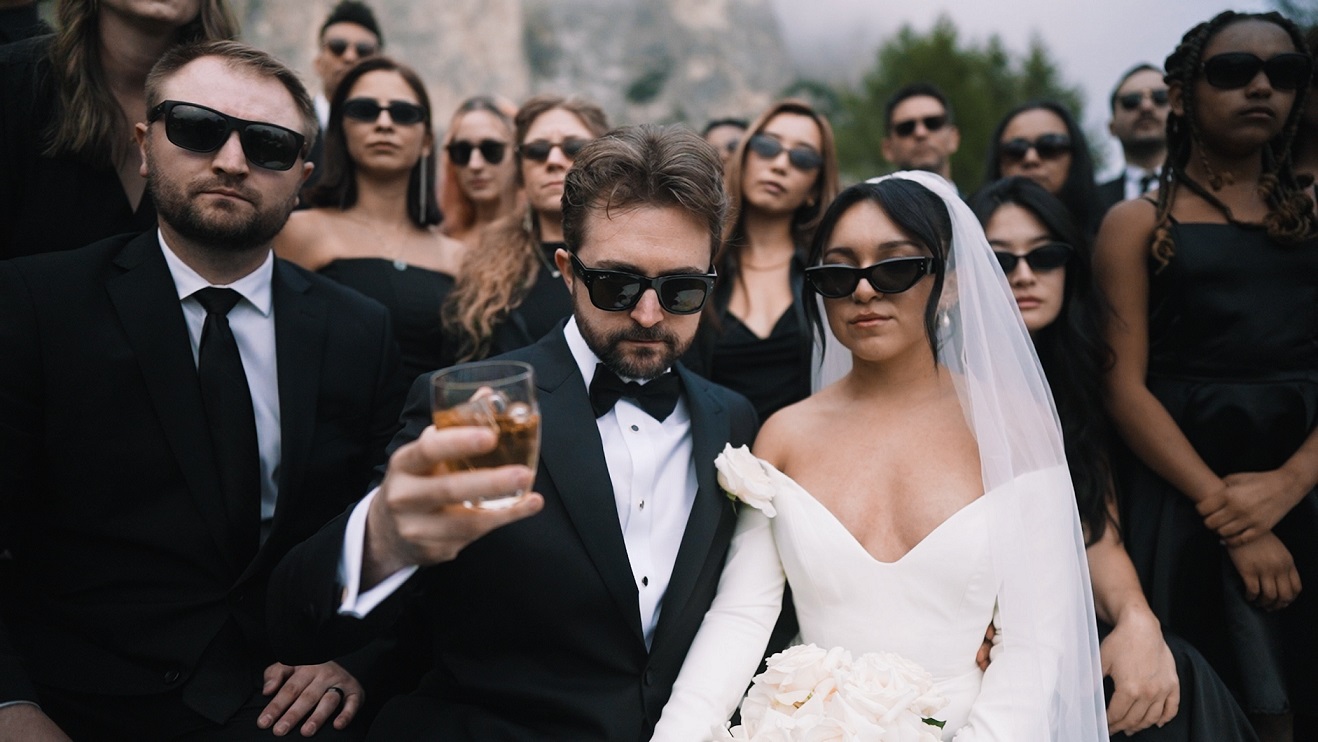 Marco De Nigris, Italian wedding videographer iconic bridal party portrait with sunglasses and black tie