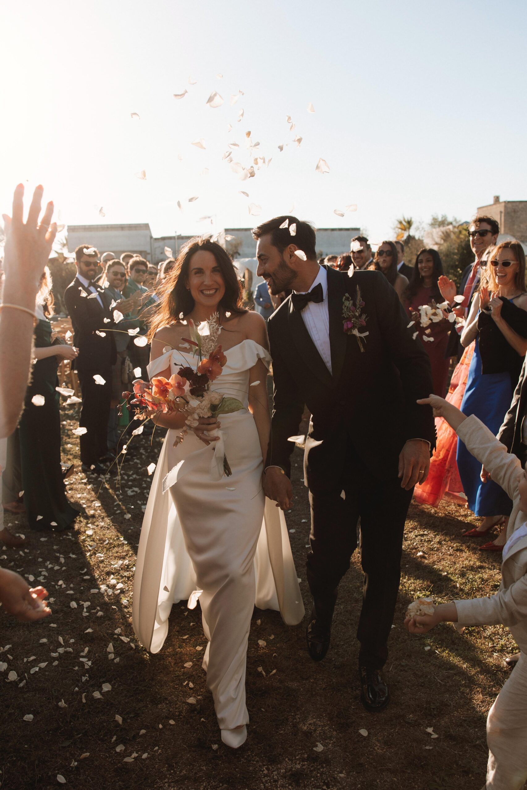 SB Weddings & Events, Italian wedding planner couple wedding ceremony bouquet and confetti