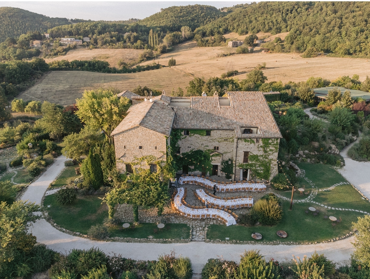 Historic Italian stone castle wedding venue, Umbrian hills, ornate gardens
