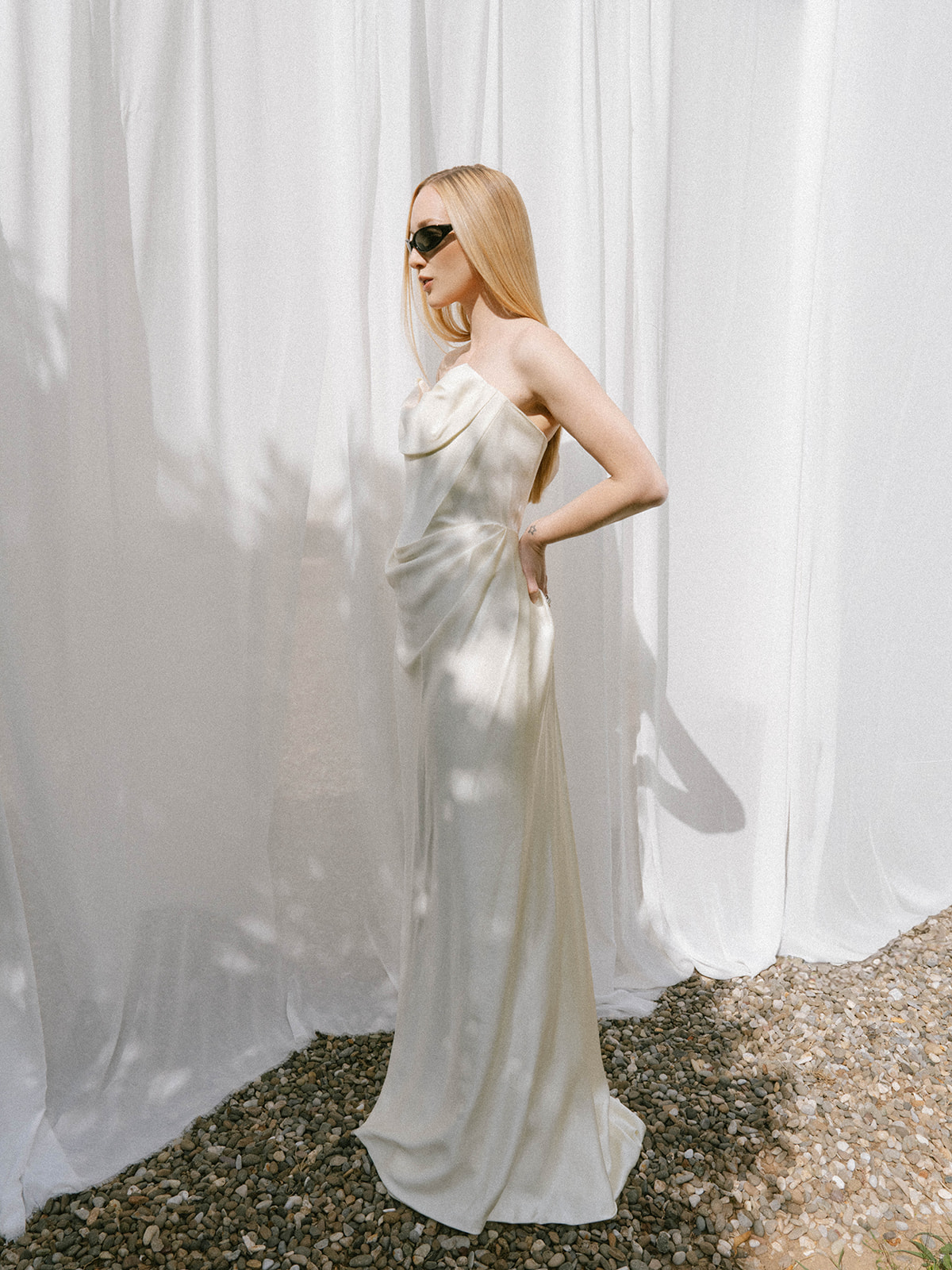Beige and Wine, Italian wedding photographer & videographer modern bride in sunglasses with draped white backdrop