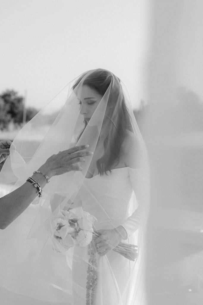 Bridal portrait by GAP weddings, ivory veil and white floral bouquet by Alfio flowers